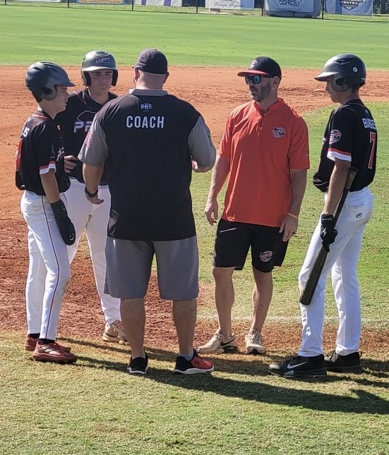 Jeff Moon coaching on a baseball field